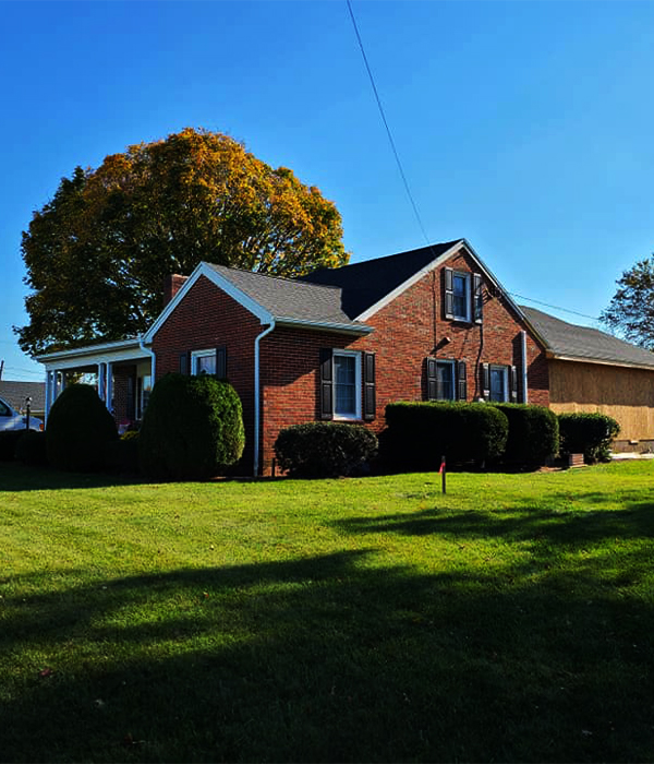 Brick house with new roof